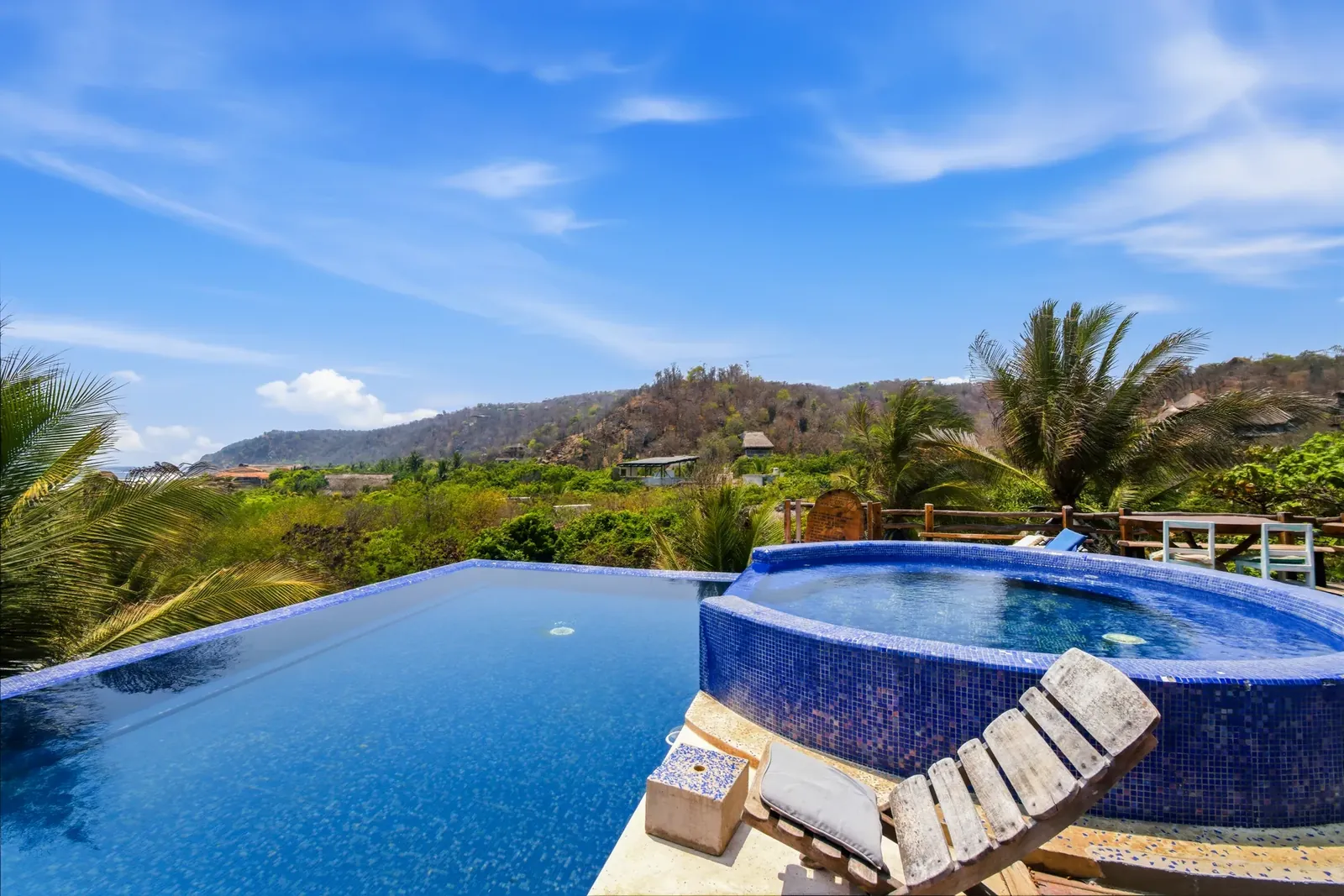 Infinity pool over the jungle with Pacific Ocean views at El Copal in Mazunte